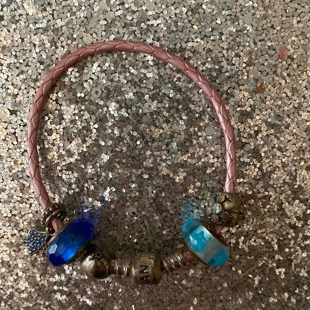 Pandora pink cord bracelet, charms included